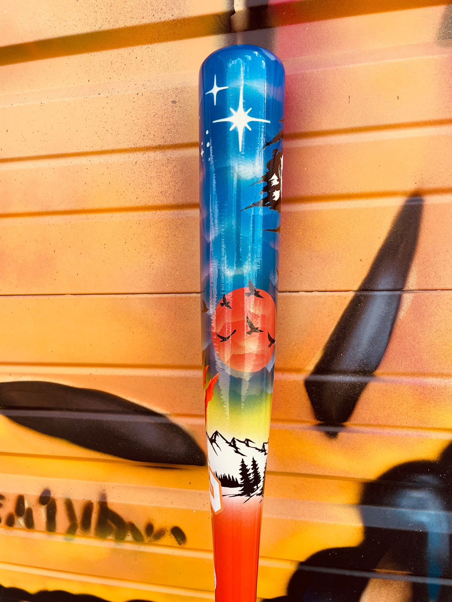 Close-up of the HC Bats Fright Night Edition barrel featuring colorful Halloween-inspired artwork, orange and blue tones, and hand-finished details.