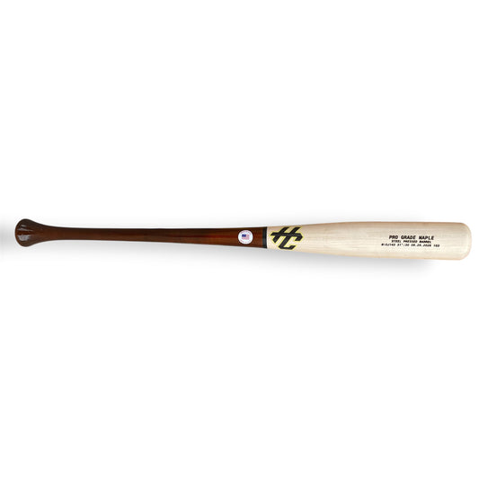 Close-up of the dark brown handle and natural maple transition on the HC CJ143 baseball bat.