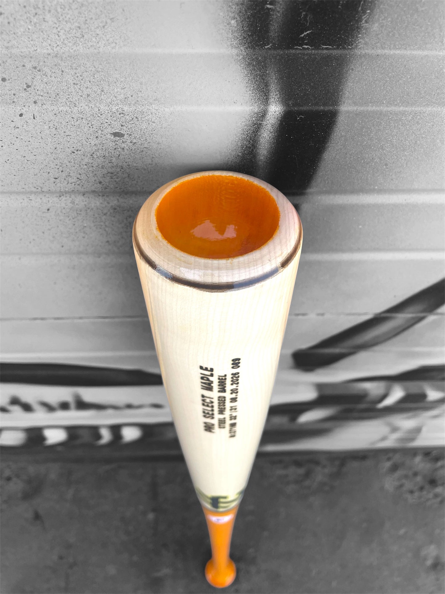 Close-up of the natural maple barrel and cupped end of the HC 271HB baseball bat with HC Bat Company logo and barrel markings.
